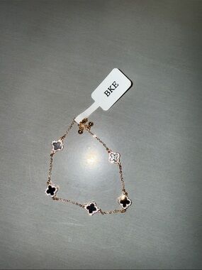 BKE Rose Gold Clover Link Bracelet with Black and White Accents